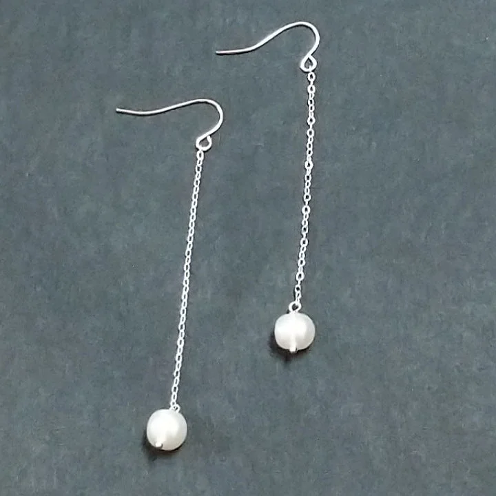 Gothic stud earrings-PEARLS ON SILVER CHAIN DROP EARRINGS