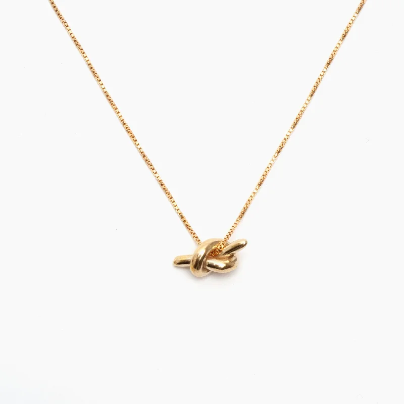 Floral pendant necklaces-Mini Knot Necklace in Brass