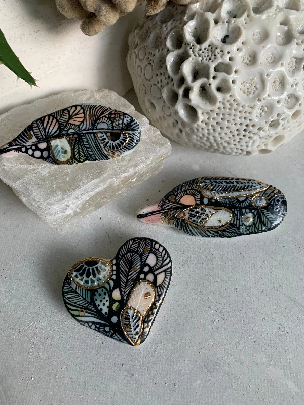 Vintage lock brooches-Sgraffito and hand painted ‘feather’ brooch, choose one