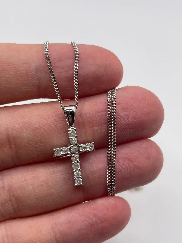 Statement pendant necklaces-18ct white gold 50 point diamond cross necklace